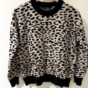 Leopard print T Tahari sweater runs oversized xs